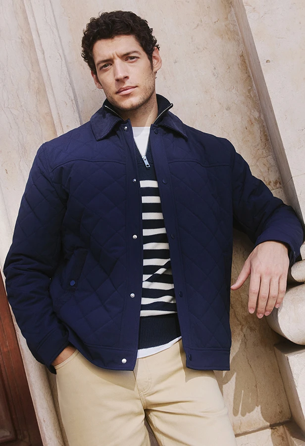 Prošívaná bunda s manšestrovým límcem tmavě modrá